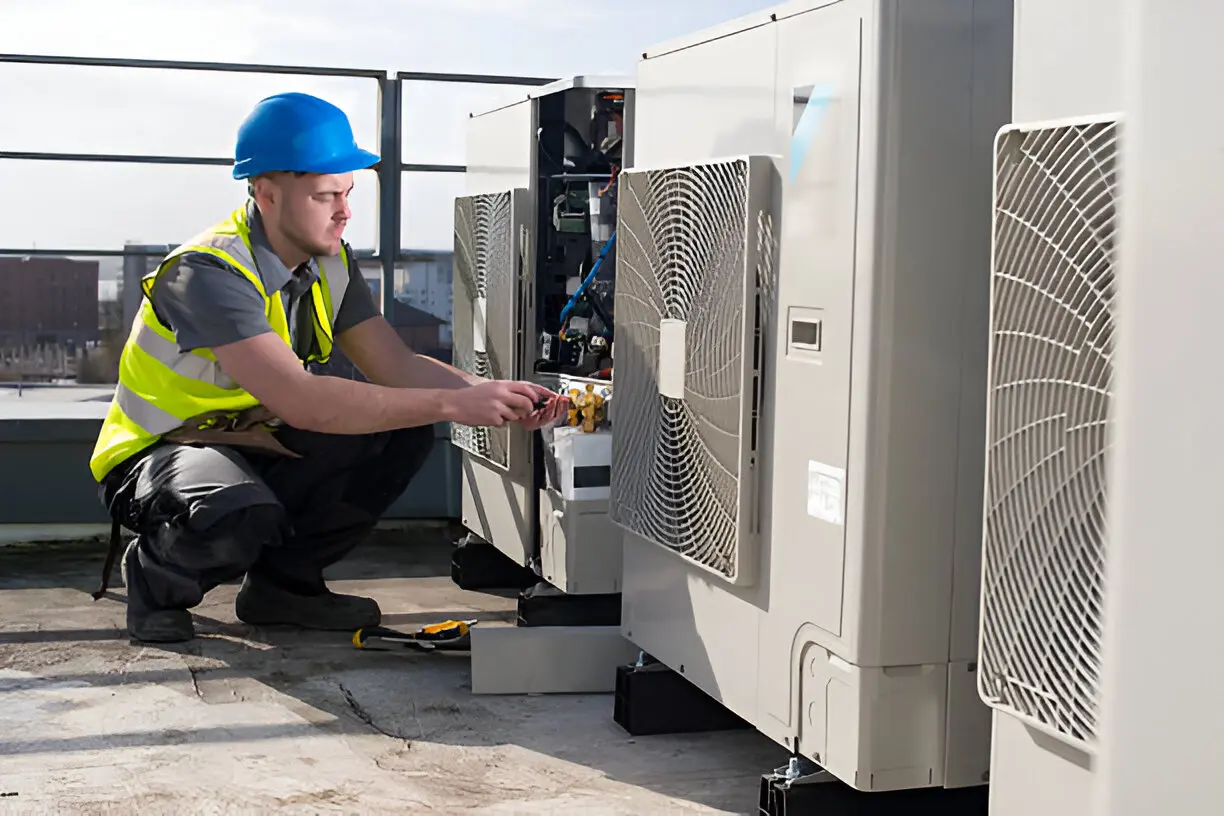 Air conditioning contractor in Orlando inspecting AC system for issues